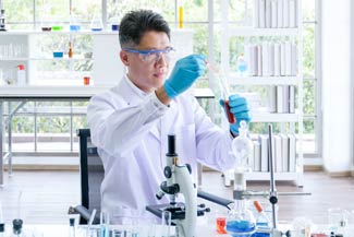 Scientist with gloves